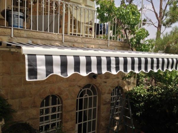 השלט - סוככים לעסקים